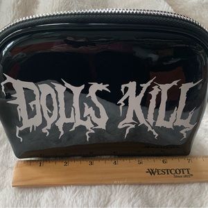 Dolls Kill patent leather makeup bag